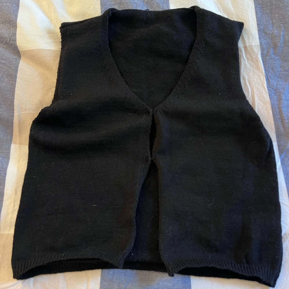 Black sweater vest